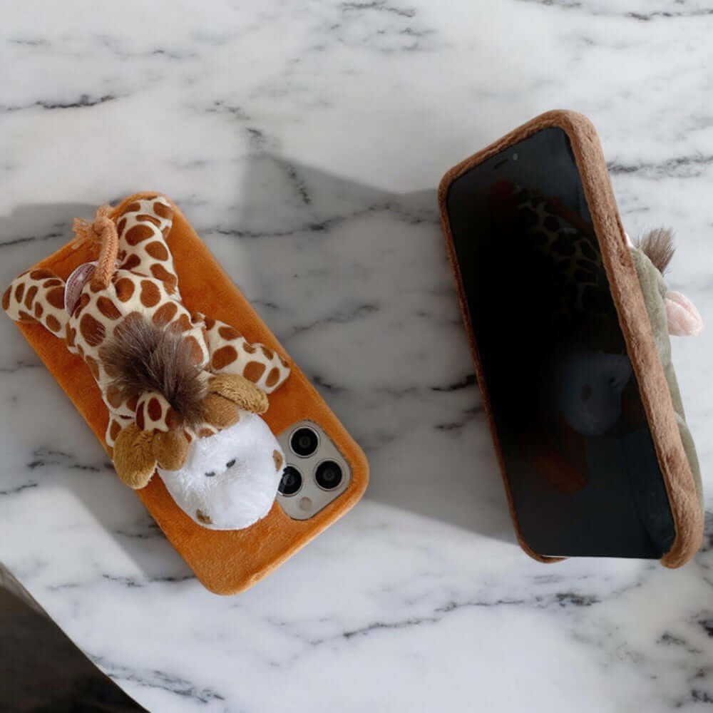 a cell phone case with a giraffe design on it