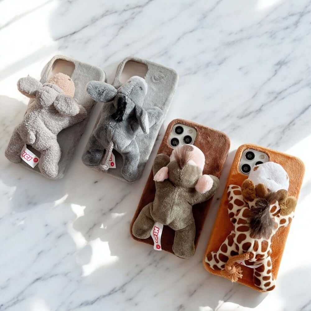 a group of four cell phones sitting on top of a table