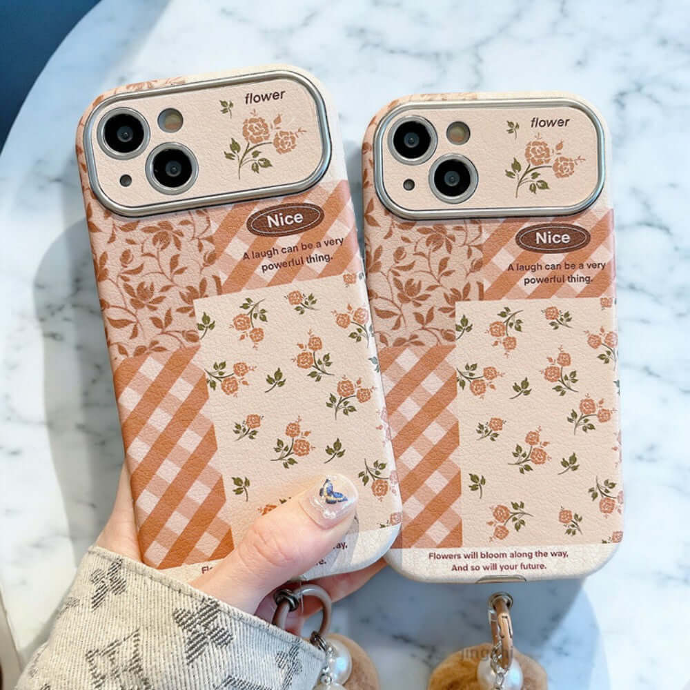 a pair of cell phones sitting on top of a table