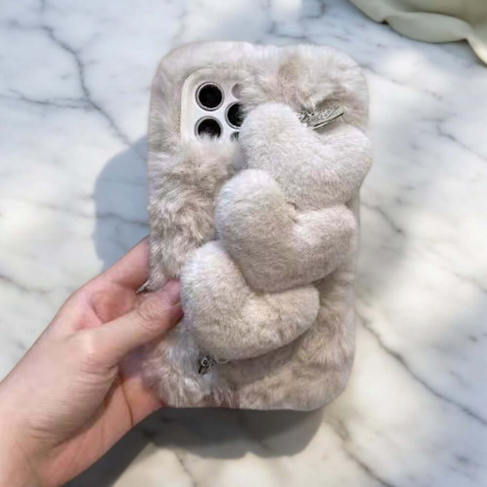 a person holding a phone case with a teddy bear on it